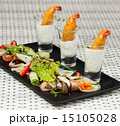 Various snacks in shot glasses 15105028