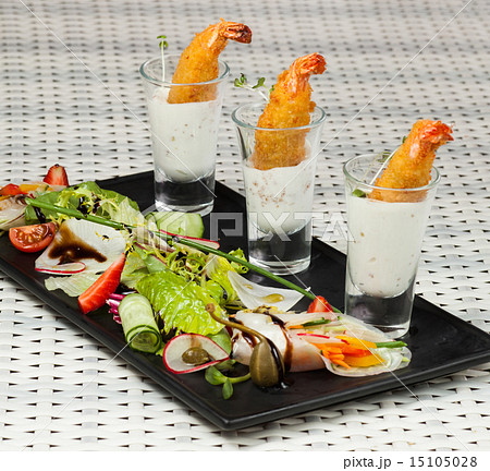 Various snacks in shot glasses 15105028