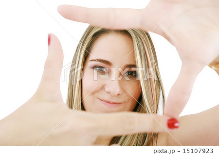 Young attractive woman framing her hands Young attractive woman framing her hands 15107923