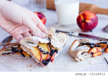 pieces of biscuits with peach and blueberry  15110411