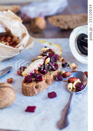sandwich with roasted beets, nuts, pear and sesame sandwich with roasted beets, nuts, pear and sesame 15110634