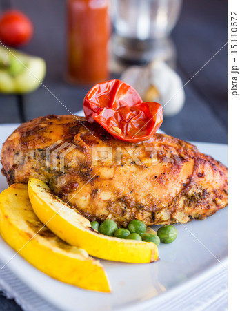 whole chicken fillet baked in a spicy sauce 15110672