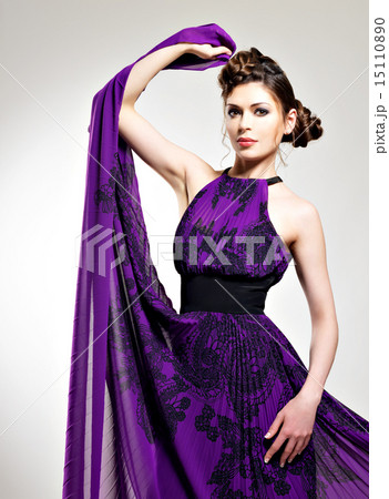 Beautiful fashion woman in purple long dress Beautiful fashion woman in purple long dress 15110890