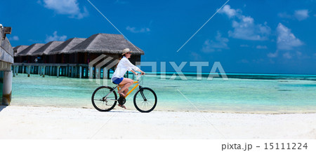 Young woman biking 15111224