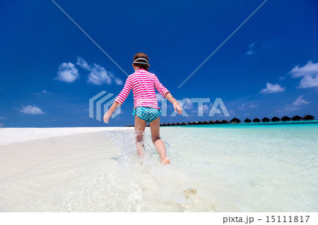 Child on a tropical vacation 15111817
