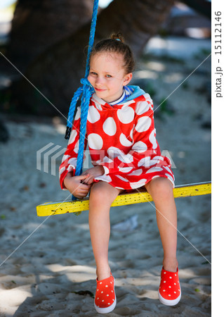 Little girl on swing 15112146