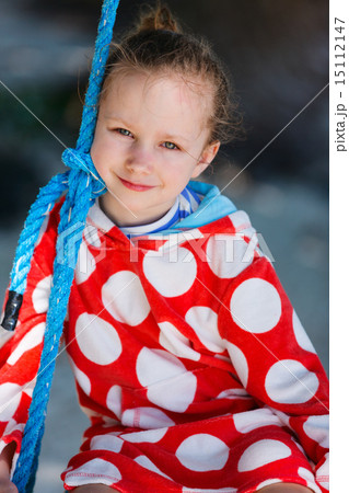 Little girl on swing 15112147