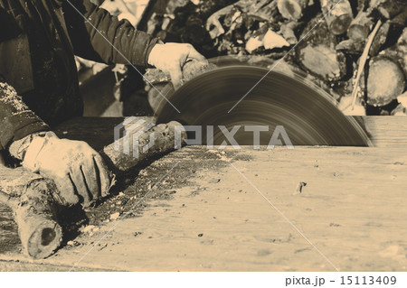 Man working with circular saw blade Man working with circular saw blade 15113409