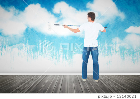 Composite image of man using paint roller on white background 15140021