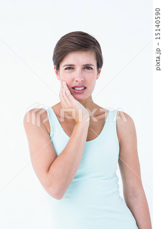 Pretty brunette getting teeth pain 15140590