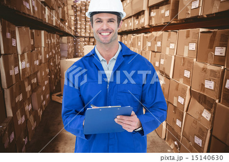 Composite image of confident supervisor writing notes 15140630