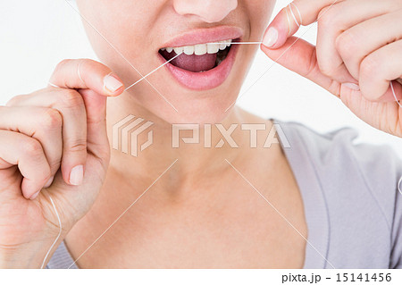 Woman using dental floss 15141456