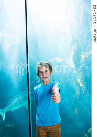 Happy young boys rising his finger Happy young boys rising his finger 15141782