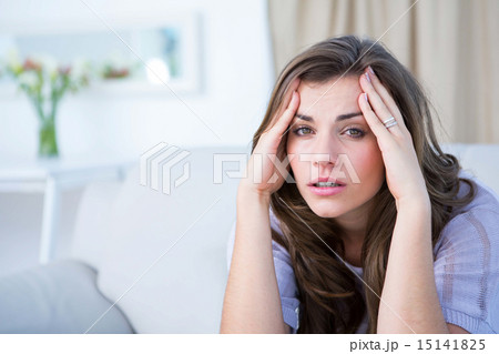 Sick woman suffering from head ache Sick woman suffering from head ache 15141825