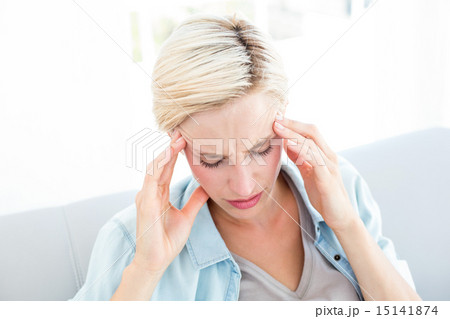 Blonde woman having headache Blonde woman having headache 15141874