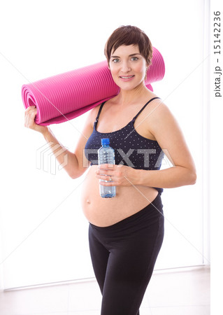 Pregnant woman keeping in shape Pregnant woman keeping in shape 15142236