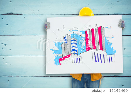 Composite image of technicial holding blank billboard 15142460