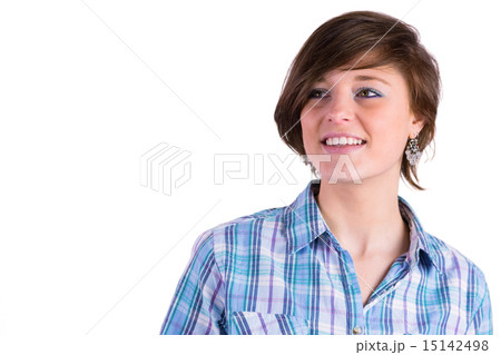 Pretty brunette thinking and smiling 15142498