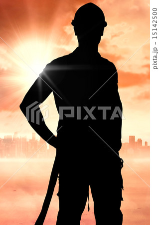 Composite image of builder in safety gear 15142500