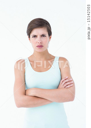 Angry woman looking at camera with arms crossed 15142503
