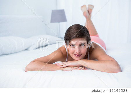 Attractive brunette smiling at camera 15142523