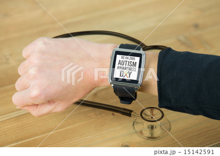 Composite image of businesswoman with smart watch on wrist Composite image of businesswoman with smart watch on wrist 15142591