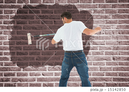 Composite image of man using paint roller on white background Composite image of man using paint roller on white background 15142850