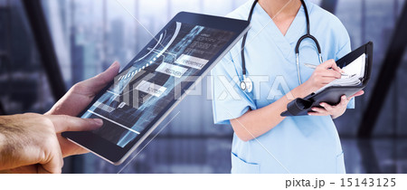 Composite image of man using tablet pc 15143125