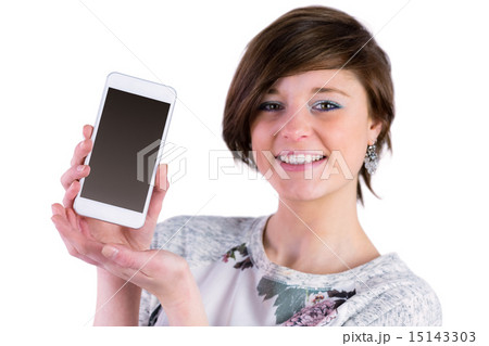 Pretty brunette showing her smartphone 15143303