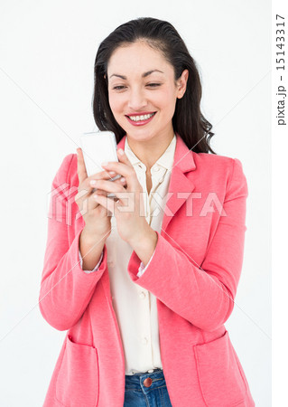 Elegant brunette texting with her mobile phone Elegant brunette texting with her mobile phone 15143317