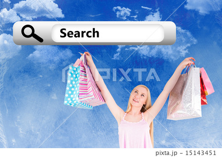 Composite image of pretty young blonde holding shopping bags 15143451