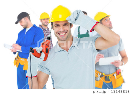 Composite image of handsome architect holding drill machine Composite image of handsome architect holding drill machine 15143813