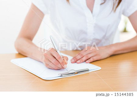 Businesswoman taking notes 15144385