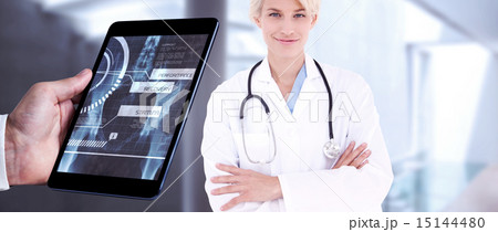Composite image of man using tablet pc 15144480
