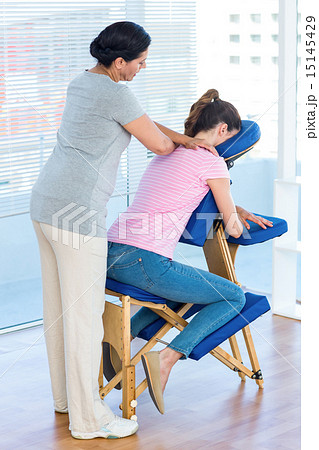 Woman having shoulders massage 15145429