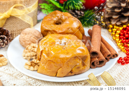 Baked apples with nuts and cinnamon. 15146091
