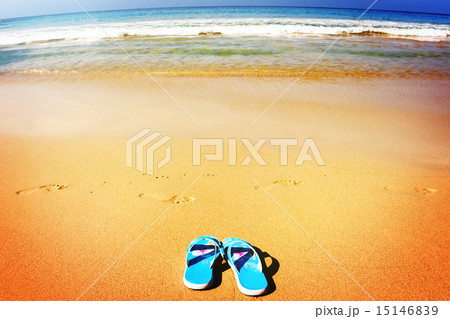 Beach sandals on tropical sandy coast 15146839