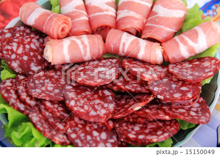 Appetizing sausage and meat on the table Appetizing sausage and meat on the table 15150049