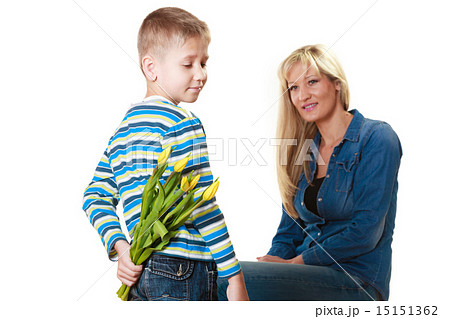 Child boy giving flowers his mother 15151362