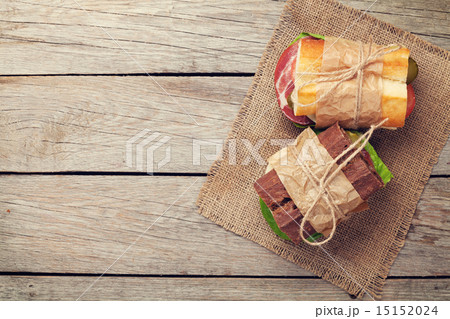 Two sandwiches with salad, ham, cheese 15152024