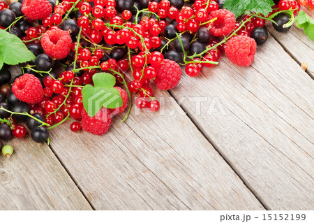 Fresh ripe berries on wooden table Fresh ripe berries on wooden table 15152199