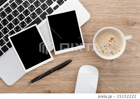 Blank instant photo frames over office table Blank instant photo frames over office table 15152222