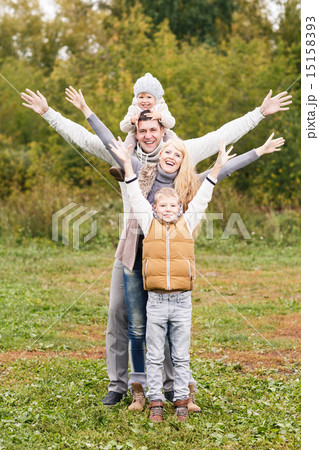 Family in the autumn park Family in the autumn park 15158393