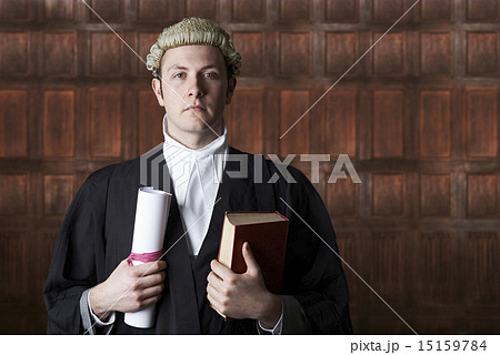 Portrait Of Lawyer In Court Holding Brief And Book 15159784