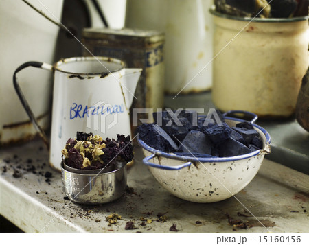 Ingredients in a bowl to create a natural dye. Indigo pigment in blocks. Ingredients in a bowl to create a natural dye. Indigo pigment in blocks. 15160456