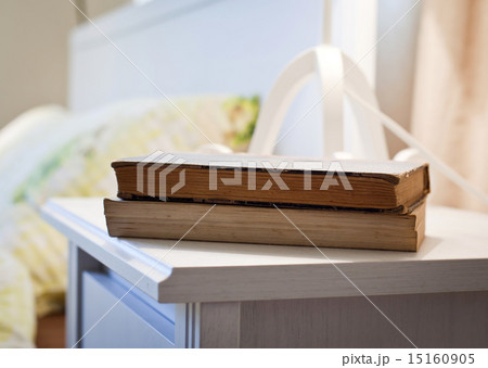 bedroom with books on nightstand 15160905