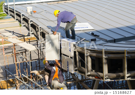 Construction worker roof installation 15168627