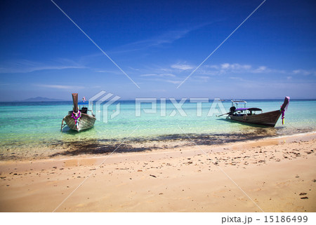 Longtail boats on the beautiful beach, Thailand 15186499