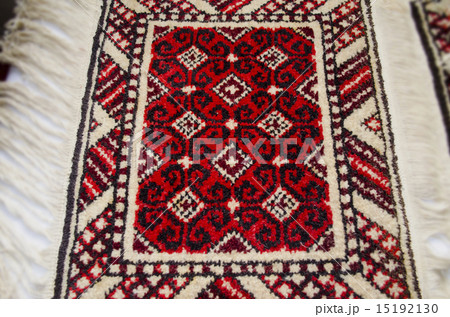 Rug handmade with black pattern on red background 15192130
