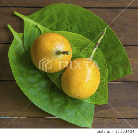 Passion Fruits on Wooden Background Passion Fruits on Wooden Background 15193404